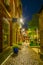 Night view of an alley passing cathedral in Leicester, England