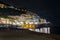 Night view of Amalfi cityscape on coast of mediterranean sea, Italy