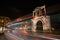 Night view Arch of Hadrian that leads to the pillars of Zeus`s archaeological site.