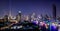 Night view of Bangkok with many river cruises