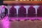 Night view of bar stand with cozy white decorative chairs