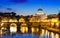 Night view of Basilica St. Peter and river Tiber in Rome