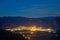 Night view Bolzano city Italy against backdrop of mountains, light of lanterns and stars