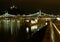 Night view of brightly lit Liberty bridge in Budapest