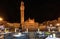 Night view of Campo Square Piazza del Campo, Palazzo Pubblico and Mangia Tower Torre del Mangia in Siena