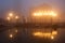 Night view canal on Murano island in the fog