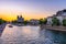 Night view of Cathedral Notre Dame de Paris, island Cite and river Seine in Paris, France.