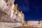 Night view of the central square in front of Palace of the Popes in Avignon city