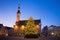 Night view of the Christmas tree near medieval The Tallinn Town Hall. Built in XIV century and firstly mentioned as consistorium