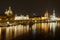 Night view of the city with Royal palace and Frauenkirche cathedral buildings and reflections in the Elbe river in Dresden, German