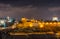 Night view of cityscape of old city Jerusalem built on top of the Temple Mount, with of Siliver dome of Al-Aqsa Mosque and golden