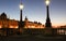 Night view of Conciergerie Castle and Bridge of Change -Pont au Change over river Seine. Paris, France