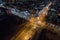 Night view of the Crossroad between Bill Clinton Boulevard and George W Bush Bd with cars passing Pristina is Kosovo capital city