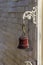 Night view of the decorative bell hanging near the front door in the old city of Safed in northern Israel