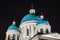 Night view domes with stars of the Troitsky Cathedral in Saint-Petersburg.