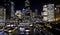 Night view of Downtown Sydney Skyline.  Illuminated Highrises and Office Towers. Sydney Ferry wharf area.