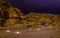 Night view of entrance to Siq canyon leading to the ancient ruins of Petra, Jordan