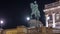 Night view of equestrian statue of Archduke Albert in front of the Albertina Museum timelapse in Vienna, Austria