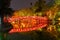 Night view of famous ancient wooden red-painted bridge in Hanoi