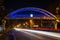 Night view of freeways with motion blur on the background of the bridge