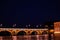 Night view of Garonne river with Pont Neuf bridge