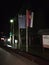 Night view of Greek and Serbian flags at Junior Hotel, Kopanik, Serbia.