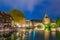 Night view of historical old town with view of Weinstadel, bridge and Henkerturm tower in Nurnberg, Germany