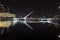 Night view of iconic landmark city of Buenos Aires El Puente de La Mujer, or Woman`s Bridge.Puerto Madero Buenos Aires Argentina