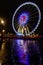 Night view of illuminated big wheel in Paris