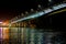 Night view of illuminated bridge above of river Don in Rostov-on-Don in Russia