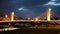 Night view of illuminated Can Peixauet Bridge across Besos River in Barcelona, Spain