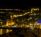 Night view image of old city near sea with ancient castle, houses and stone walls scenery between lights from Alanya Antalya Turke