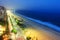 Night view of Ipanema beach after sunset, with fog from the sea