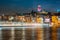 Night view of Istanbul cityscape Galata Tower with floating tourist boats in Bosphorus ,Istanbul Turkey