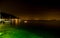 Night view of Lake Garda and the illuminated villages on the west coast.