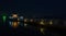 Night view of lakeside jetty with small Shinto shrine, Shibayamagata Lake, Ishikawa Prefecture, Japan