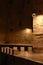 Night view of lanterns illuminating old houses, coastal road in Monopoli, Italy