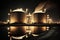 night view of large oil tanks at repair shop of refinery complex