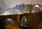 Night view of medieval bridge over river at Besalu