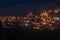 Night view on Mestia with its beautiful illuminated Svan Towers and high mountains. Svaneti, Georgia