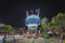 Night view of the Mihama Carnival Park Ferris wheel located in the American Village neighborhood of Naha City decorated with palm