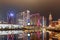 Night view of modern buildings reflected in water, Cotai, Macau