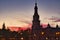 Night view of the monument of plaza de spain in seville, spain. Reddish sky at sunset in the city