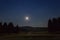 Night view with moon of golf course in Cansiglio Forest, Veneto, Italy