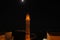 night view of the mosque in marding under full moon,