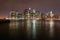 Night view of the most emblematic buildings and skyscrapers of Manhattan (New York). Brooklyn bridge. River Hudson.