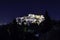 Night view from Mount Areopagus from the main entrance to the Acropolis illuminated at nightfall, Athens, Greece