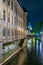 Night view of the new town hall in Hannover behind Leine creek, Germany