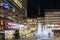 Night view over Sergels Torg decorated with moose and trees sculptures made from led lights during Christmas season