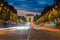 Night view of Paris traffic in Champs-Elysees street and the Arc